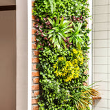 Artificial green wall panel with variegated mixed green, yellow, red foliage & white flowers 100x100 cm