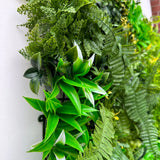 Artificial green wall panel with variegated greens and yellow foliage palms grasses ferns with yellow and white tipped foliage  100x100 cm
