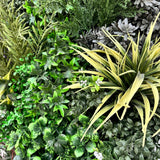 Artificial 3D plant wall with lush green, purple, red and white foliage 100x50cm
