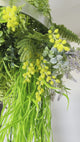 Hanging hoop with a mixture of artificial green plants with yellow flowers 40cm diameter