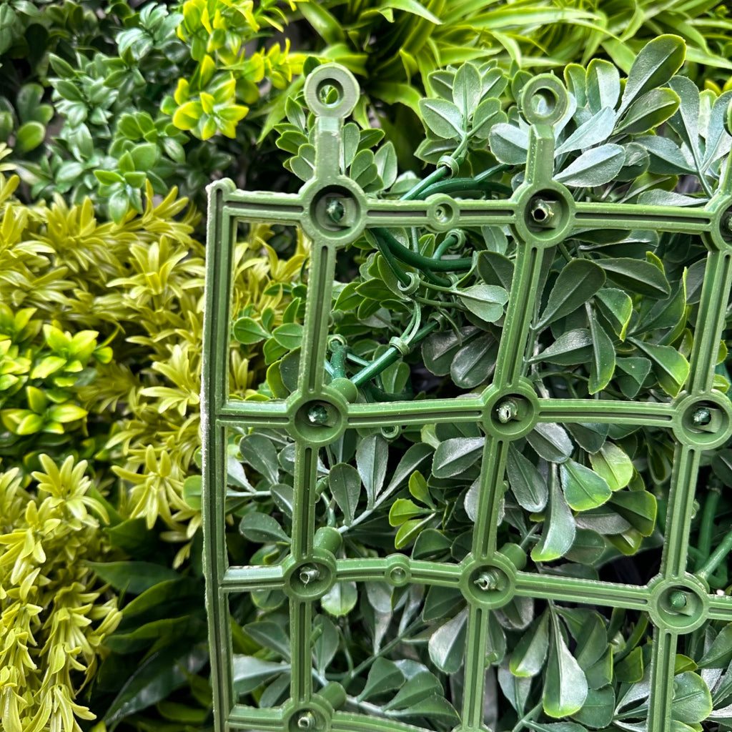 Green wall panel variegated light and dark green foliage  palms heads, green grasses & ferns & purple bushes 100x100 cm