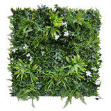 Artificial green wall panel with variegated foliage ivy palms grasses and ferns with white flowers 100x100 cm
