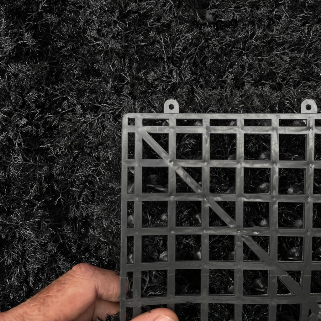 Artificial moss panel with grid backing and dark reindeer moss texture