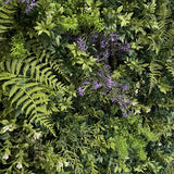 Artificial 3D plant wall with green foliage and small purple flowers - 100x100cm